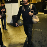 NBA Style: Derrick Rose Wears A Valentino Feather Embroidered Sweatshirt & Saint Laurent Color-Block Classic Suede High Top Sneakers