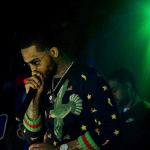 Rapper Dave East Performs In A Gucci Wool Sweater With Embroideries