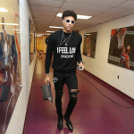NBA Style: Kelly Oubre Jr. Wears A Givenchy ‘I Feel Love’ Sweater