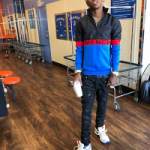 Rich The Kid Stepped Out In A Givenchy Half-Zip Colorblock Jacket & White 1952 Star Trainer Sneakers