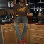 Rapper G Herbo Spotted In A Gucci x Dapper Dan Tee-Shirt & Raf Simons Sneakers