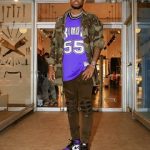 Rapper Fabolous Styles In A Faith Connexion Jewel Studded Camouflage Shirt And Amiri Frayed Knee Jeans