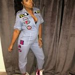 Remy Ma Styled A Miu Miu Badge Appliqué Cotton Blend Jumpsuit With Prada Laced Leather Booties