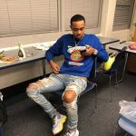 G Herbo Wears A Gucci Sweatshirt With ‘Gucci’ ’80s Patch & Balenciaga Grey And Blue Triple S Sneakers