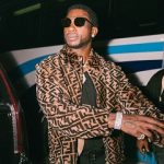 Rapper Gucci Mane Rocks A Fendi Reversible Logo-Print Shearling And Leather Bomber Jacket