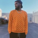 NBA Player Karl-Anthony Towns Dressed In A Louis Vuitton Full Monogram Jacquard Crewneck