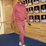 Basketball Player Ja Morant Wears A Nike Men Club Fleece Zip Hoodie And Men’s Club Fleece Joggers