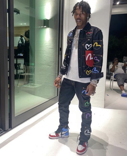Lil Baby Outfitted In A Palace Evisu Multi Pocket Jacket, Jeans