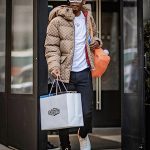 Joshua Christopher Bundled-Up In A Gucci x The North Face Hooded Puffer Jacket, Plus His Off White X Air Jordan 2 Retro Low SP White Varsity Red Sneakers