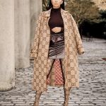 R&B Soul Singer Monica Performs In A Gucci Women’s Natural Canvas Jumbo Logo All Over Trench Coat And Gucci Women’s The Hacker Project Maxi GG Pantaleggings