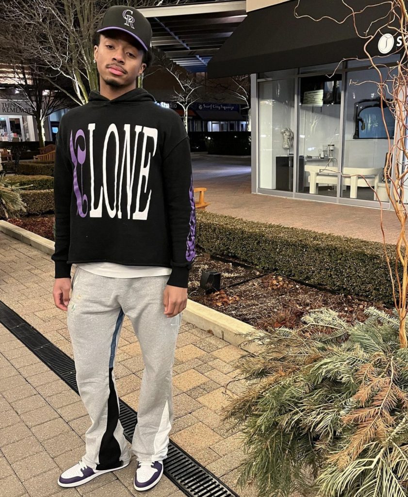 College Basketball Fashion: Tavares Oliver Jr. Wears A Vlone x Palm Angels  Hoodie, MNML Contrast Bootcut Sweatpants And Air Jordan 1 Retro High OG  Court Purple 2.0 - Donovan Moore Fashion Book