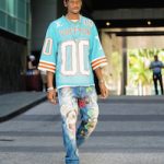 Shai Gilgeous-Alexander Stepped Out In A Louis Vuitton Hockey Jersey T-Shirt, Proleta Re Art Psychedelic Rat Embroidery Jeans And Nike × Off-White Air Jordan 1 Sneakers