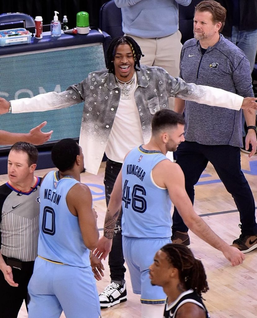 NBA Player Ja Morant Spotted Courtside In A Louis Vuitton Colorful White T- Shirt, Ollie Yellow Multicolor Sneakers And Serenede Everest Peak Jeans -  Donovan Moore Fashion Book