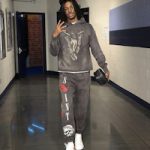 Basketball Player Ja Morant Outfitted In A Vlone x Saint Michael Hoodie, Sweatpants And Alexander McQueen Sneakers