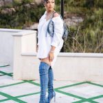 Jordyn Woods Accessorized A White Shirt Dress With A Balenciaga Le Cagole Denim Shoulder Bag And Diesel D-YUCCA OTK Thigh High Boots