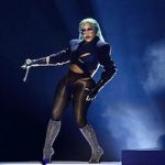Lil’ Kim’s Viral BET Awards 2022 Performance In Cutout Blazer, Bodysuit & Bedazzled Knee High Boots Tops Google’s Biggest Searches