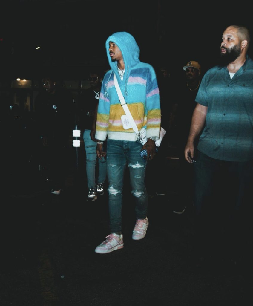 NBA Player Ja Morant Spotted Courtside In A Louis Vuitton Colorful White  T-Shirt, Ollie Yellow Multicolor Sneakers And Serenede Everest Peak Jeans -  Donovan Moore Fashion Book