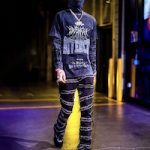 NBA Player LaMelo Ball Stepped Out In A Givenchy Layered Graphic T-Shirt w/ Balaclava, Valabasas Stacked Flared Jeans And Dior Men’s B22 Sneakers