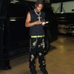 Lil Baby Wears A Pair Of Chrome Hearts Leopard Cross Patch Jeans And Louis Vuitton x Nike Air Force 1 Low By Virgil Abloh
