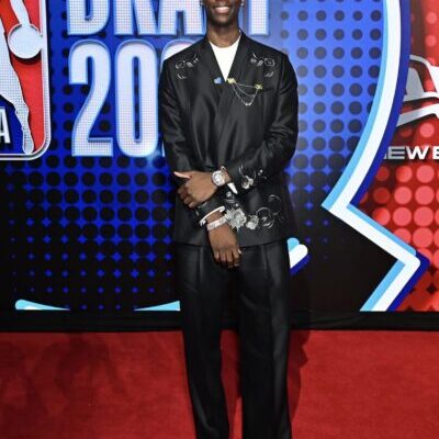 Man in black suit at NBA Draft
